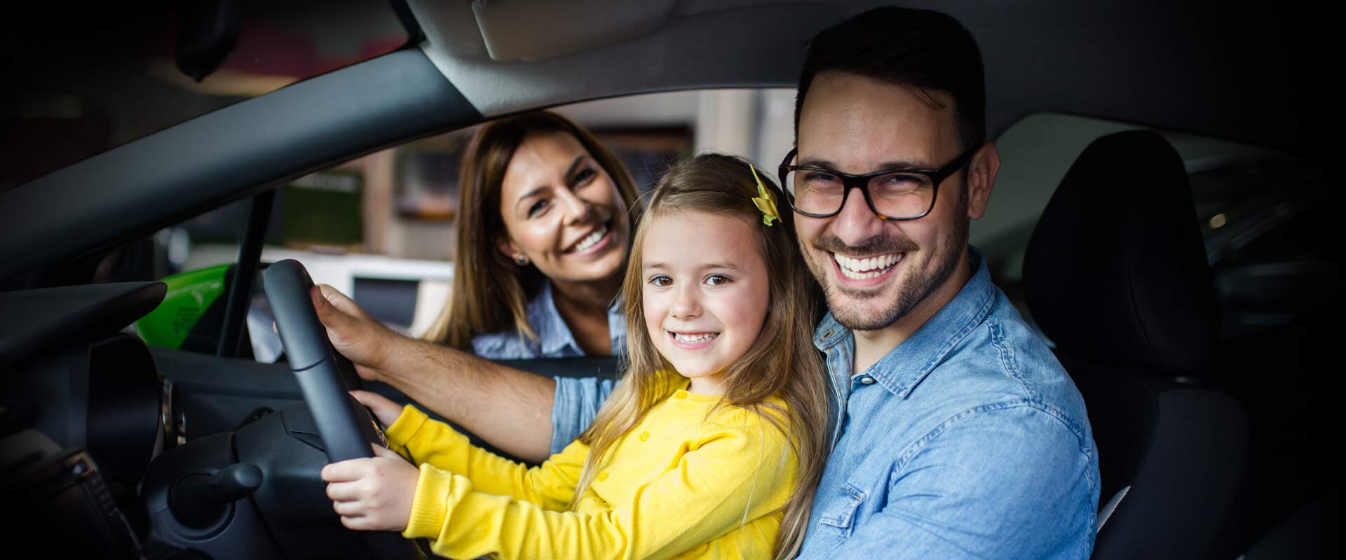 family in their new vehicle