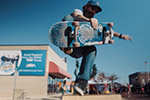 A skateboarder doing tricks on a ramp on the Gilmer, TX town square